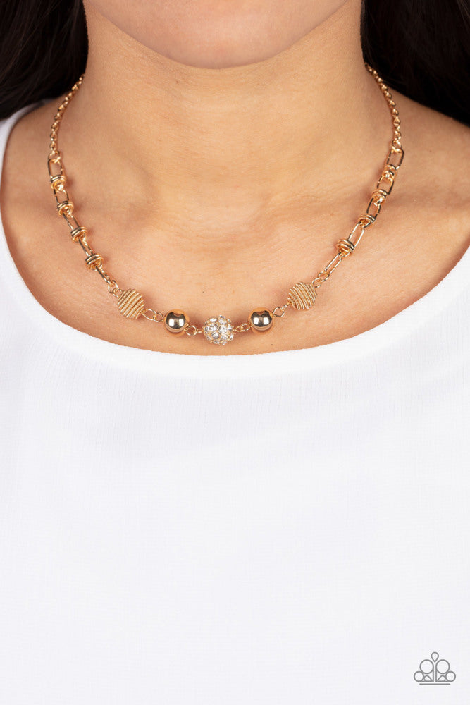 Taunting Twinkle - Gold ~ Paparazzi Necklace